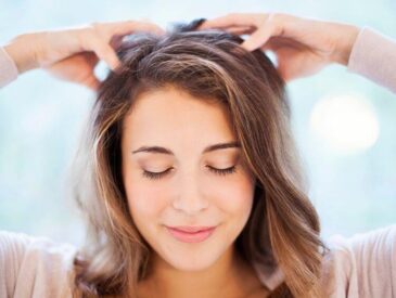 woman massaging scalp