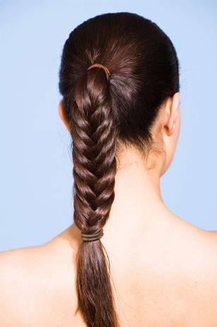 dark brown hair in fishtail braid ponytail