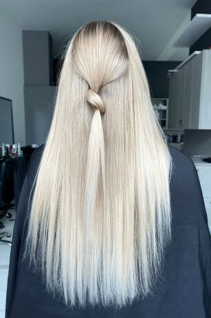 blonde hair with half up knot hairstyle